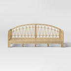 Rattanowa leżanka dziecięca z zaokrąglonymi bokami